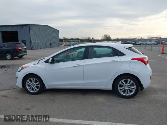 2013 Hyundai Elantra GT with VIN KMHD35LE1DU145894, listed as a IAAI auction lot 41828751 with 90,529 mi miles. Bid and sale history available at carsss.com. Image 14.
