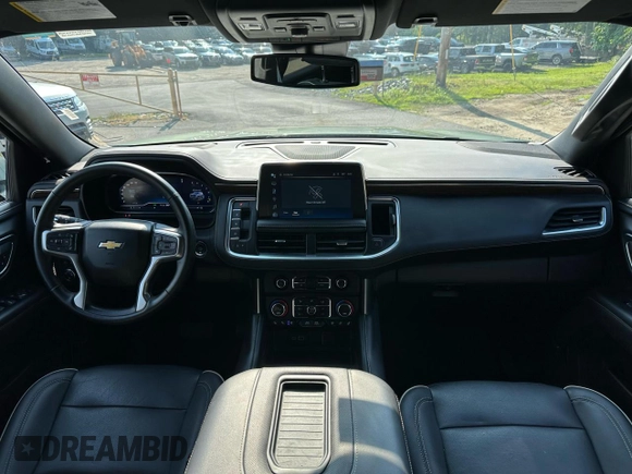 2023 Chevrolet Suburban Premier with VIN 1GNSCFKD0PR550962, listed as a Copart auction lot 63825105 with 24,722 mi miles and Salvage title. Bid and sale history available at DreamBid. Image 7.