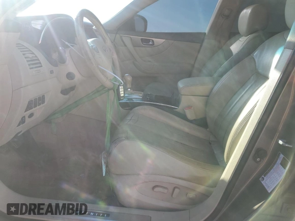 2016 Infiniti QX70 with VIN JN8CS1MU8GM670655, listed as a Copart auction lot 47000555 with 152,574 mi miles and Salvage Title. Bid and sale history available at DreamBid. Image 7.
