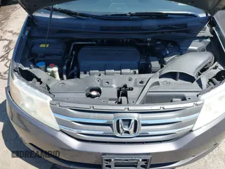 2012 Honda Odyssey EX-L with VIN 5FNRL5H68CB006686, listed as a IAAI auction lot 42039035 with 338,331 mi miles and . Bid and sale history available at carsss.com. Image 10.