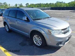 2015 Dodge Journey SXT with VIN 3C4PDCBG4FT656826, listed as a IAAI auction lot 41981425 with 131,847 mi miles. Bid and sale history available at carsss.com. Image 1.