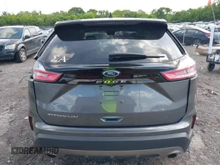 2021 Ford Edge Titanium z VIN 2FMPK3K9XMBA21766, wystawiony jako IAAI lot #42187940 z przebiegiem 79 732 mil mil oraz . Historia ofert i sprzedaży dostępna na DreamBid. Obrazek 16.
