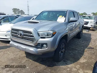 2017 Toyota Tacoma SR5 with VIN 5TFAZ5CN3HX042874, listed as a IAAI auction lot 42022752 with 104,013 mi miles and . Bid and sale history available at carsss.com. Image 2.