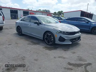2023 Kia K5 GT-Line z VIN 5XXG64J25PG179696, wystawiony jako IAAI lot #42114587 z przebiegiem 49 192 mil mil oraz . Historia ofert i sprzedaży dostępna na DreamBid. Obrazek 1.