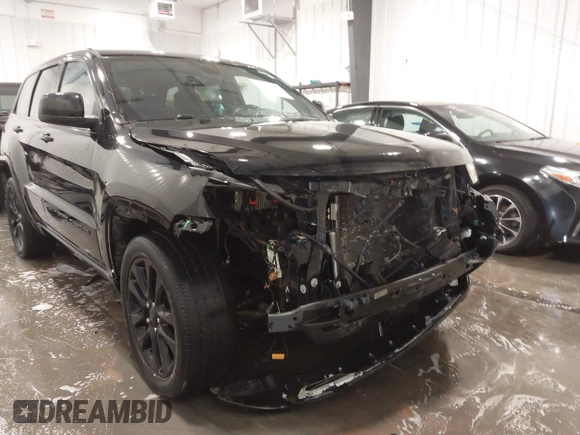2019 Jeep Grand Cherokee Laredo E with VIN 1C4RJFAG6KC819518, listed as a IAAI auction lot 41856979 with 49,155 mi miles. Bid and sale history available at carsss.com. Image 6.
