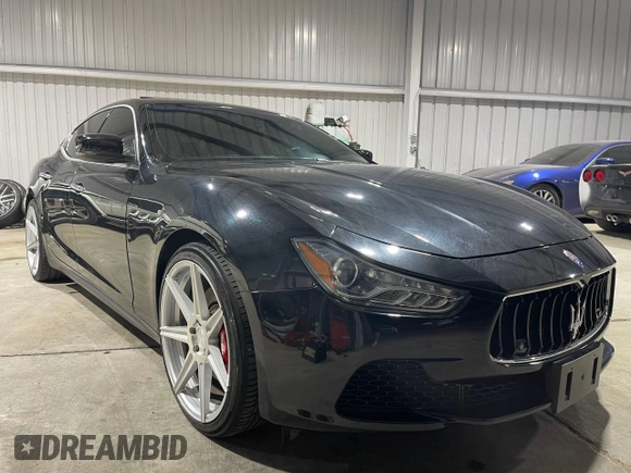 2014 Maserati Ghibli S Q4 z VIN ZAM57RTA9E1112724, wystawiony jako Copart lot #73739204 z przebiegiem 45 525 mil mil oraz Szkoda całkowita • Salvage title. Historia ofert i sprzedaży dostępna na DreamBid. Obrazek 1.