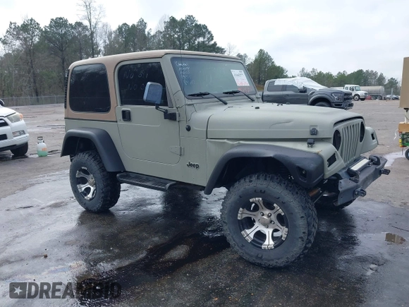 1999 Jeep Wrangler Sahara with VIN 1J4FY49S0XP480017, listed as a IAAI auction lot 41642577 with 154,068 mi miles. Bid and sale history available at carsss.com. Image 1.