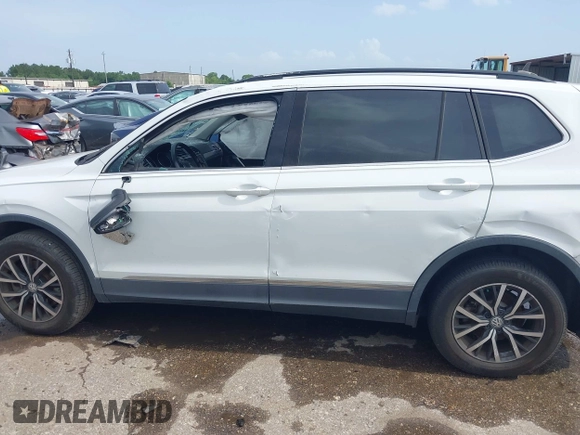 2018 Volkswagen Tiguan SEL with VIN 3VV2B7AX3JM199908, listed as a IAAI auction lot 42498185 with 58,540 mi miles and . Bid and sale history available at DreamBid. Image 13.