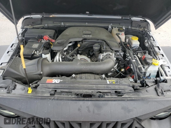 2020 Jeep Wrangler Unlimited Willys z VIN 1C4HJXDG5LW216718, wystawiony jako Copart lot #53144705 z przebiegiem 27 932 mil mil oraz Czysty tytuł • Clean title. Historia ofert i sprzedaży dostępna na DreamBid. Obrazek 12.
