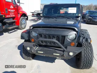 2013 Jeep Wrangler Unlimited Sahara with VIN 1C4BJWEG3DL617511, listed as a IAAI auction lot 41842979 with 149,980 mi miles and . Bid and sale history available at DreamBid. Image 12.