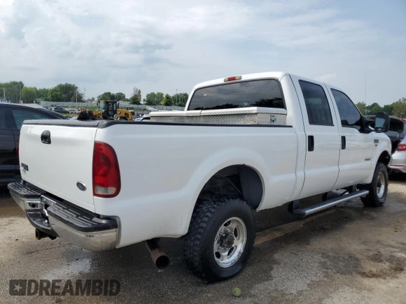 2004 Ford Super Duty F-250 XL with VIN 1FTNW21P14EA23582, listed as a Copart auction lot 62658954 with 205,382 mi miles and Salvage Title. Bid and sale history available at carsss.com. Image 3.
