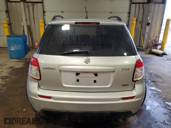2010 Suzuki SX4 z VIN JS2YB5A31A6302436, wystawiony jako Copart lot #88473455 z przebiegiem 78 839 mil mil oraz Szkody całkowita. Historia ofert i sprzedaży dostępna na DreamBid. Obrazek 6.