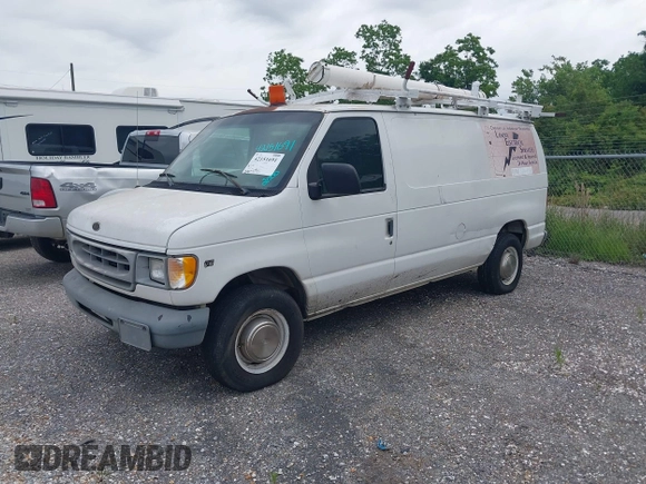 2000 Ford Econoline Cargo with VIN 1FTNE24L8YHB14204, listed as a IAAI auction lot 42151691 with 240,475 mi miles and . Bid and sale history available at DreamBid. Image 2.