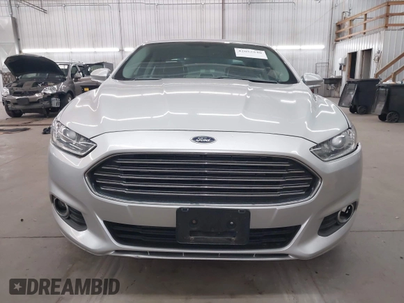 2013 Ford Fusion SE Hybrid with VIN 3FA6P0LU7DR228691, listed as a IAAI auction lot 42055540 with 144,389 mi miles and . Bid and sale history available at DreamBid. Image 12.