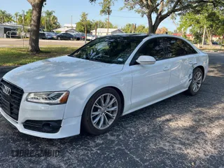 2017 Audi A8 Sport z VIN WAU43AFD7HN005619, wystawiony jako Copart lot #57526015 z przebiegiem 57 262 mil mil oraz Szkoda całkowita • Salvage title. Historia ofert i sprzedaży dostępna na DreamBid. Obrazek 2.