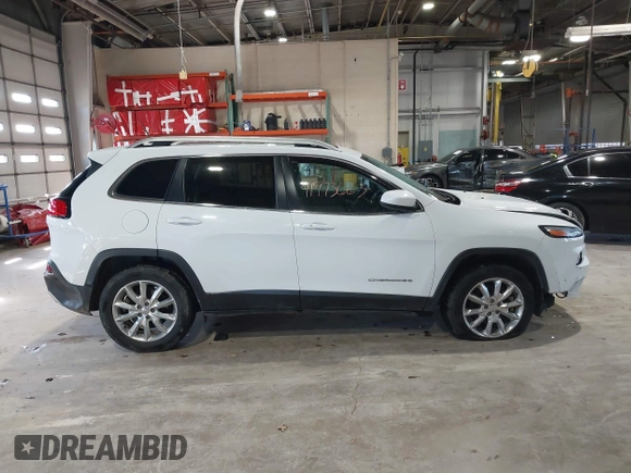 2015 Jeep Cherokee Limited with VIN 1C4PJMDS3FW728884, listed as a IAAI auction lot 41973663 with 112,719 mi miles. Bid and sale history available at carsss.com. Image 13.