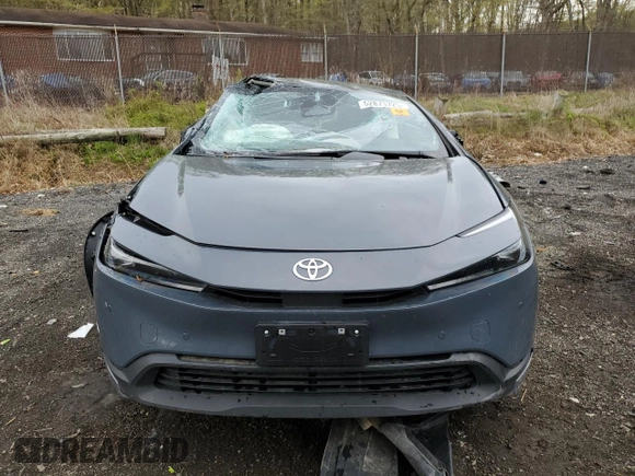 2024 Toyota Prius LE z VIN JTDACAAU6R3026309, wystawiony jako Copart lot #52873725 z przebiegiem 19 520 mil mil oraz Nie do naprawy • Non repairable. Historia ofert i sprzedaży dostępna na DreamBid. Obrazek 5.