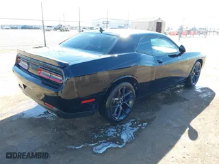 2021 Dodge Challenger SXT with VIN 2C3CDZAGXMH531228, listed as a IAAI auction lot 41473536 with 47,650 mi miles. Bid and sale history available at carsss.com. Image 4.