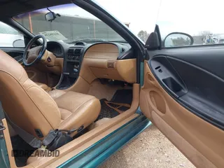 1996 Ford Mustang GT with VIN 1FALP45X7TF129303, listed as a IAAI auction lot 41698238 with 130,181 mi miles. Bid and sale history available at carsss.com. Image 5.