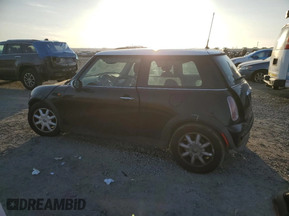 2004 MINI Hardtop with VIN WMWRC33484TJ59008, listed as a Copart auction lot 46003105 with 83,303 mi miles and Salvage Title. Bid and sale history available at DreamBid. Image 2.