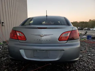 2010 Chrysler Sebring Touring with VIN 1C3CC4FB3AN219709, listed as a Copart auction lot 80839914 with 223,685 mi miles and Salvage Title. Bid and sale history available at carsss.com. Image 6.