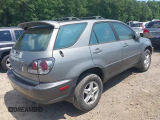 2003 Lexus RX 300 with VIN JTJHF10U030295855, listed as a IAAI auction lot 42532724 with 173,460 mi miles and . Bid and sale history available at DreamBid. Image 4.