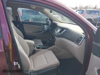 2017 Hyundai Tucson Value with VIN KM8J33A25HU530459, listed as a IAAI auction lot 40889753 with 62,223 mi miles. Bid and sale history available at carsss.com. Image 5.