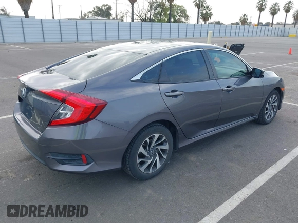 2016 Honda Civic Sedan EX with VIN 19XFC2F78GE238603, listed as a IAAI auction lot 41915703 with 173,871 mi miles. Bid and sale history available at carsss.com. Image 4.