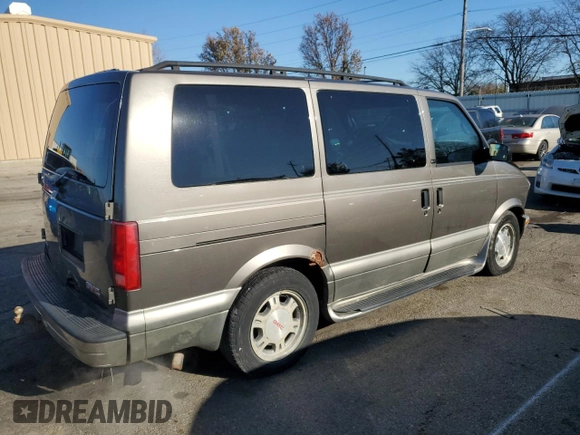 2003 GMC Safari z VIN 1GKDM19X13B516327, wystawiony jako Copart lot #83827794 z przebiegiem 200 280 mil mil oraz Szkoda całkowita • Salvage title. Historia ofert i sprzedaży dostępna na DreamBid. Obrazek 3.