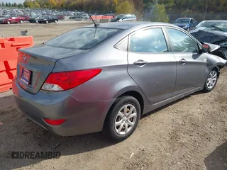 2014 Hyundai Accent GLS with VIN KMHCT4AE9EU614191, listed as a IAAI auction lot 37899279 with 144,247 mi miles. Bid and sale history available at carsss.com. Image 4.