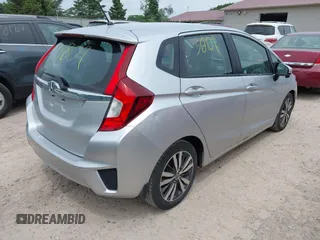 2015 Honda Fit EX-L z VIN 3HGGK5H8XFM730425, wystawiony jako IAAI lot #42503809 z przebiegiem 105 469 mil mil oraz . Historia ofert i sprzedaży dostępna na DreamBid. Obrazek 4.