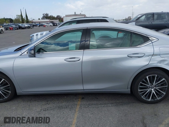 2023 Lexus ES 300h with VIN 58ADA1C10PU036237, listed as a IAAI auction lot 41914763 with 64,193 mi miles and . Bid and sale history available at DreamBid. Image 14.
