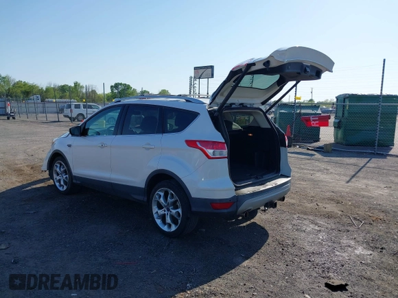 2013 Ford Escape Titanium with VIN 1FMCU0J97DUA70393, listed as a IAAI auction lot 41974106 with 73,548 mi miles and . Bid and sale history available at carsss.com. Image 3.