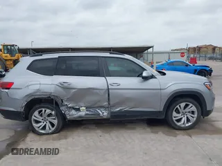2021 Volkswagen Atlas SE с VIN 1V2JR2CA2MC539992, выставлен на аукционе IAAI как лот 42133933 с пробегом 82 287 миль миль и . История ставок и продаж доступна на DreamBid. Изображение 13.