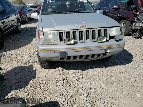 1995 Jeep Grand Cherokee Limited с VIN 1J4GZ78SXSC579786, выставлен на аукционе Copart как лот 72280424 с пробегом Не указан миль и На запчасти • Non repairable. История ставок и продаж доступна на DreamBid. Изображение 11.