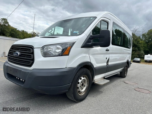 2015 Ford Transit Wagon XL with VIN 1FDZX2CM5FKA43044, listed as a Copart auction lot 73170894 with 215,199 mi miles and Clean Title. Bid and sale history available at carsss.com. Image 1.