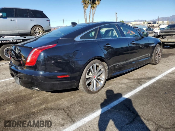 2018 Jaguar XJ with VIN SAJWA1C79J8W14555, listed as a Copart auction lot 39950303 with 86,316 mi miles. Bid and sale history available at carsss.com. Image 3.