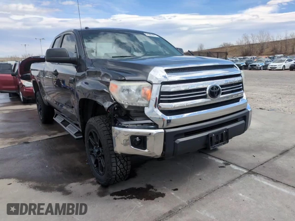 2017 Toyota Tundra SR z VIN 5TFUW5F19HX656990, wystawiony jako Copart lot #51087865 z przebiegiem 123 481 mil mil oraz Szkoda całkowita • Salvage title. Historia ofert i sprzedaży dostępna na DreamBid. Obrazek 13.