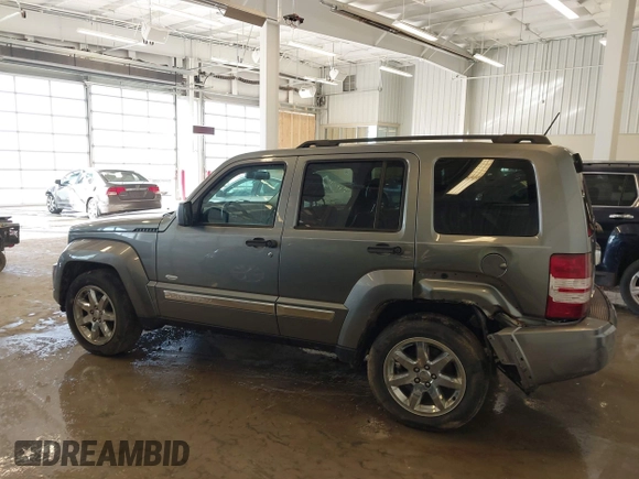 2012 Jeep Liberty Sport with VIN 1C4PJMAK9CW176792, listed as a IAAI auction lot 41685594 with 213,748 mi miles. Bid and sale history available at carsss.com. Image 13.