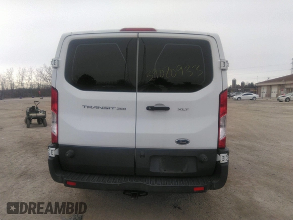 2018 Ford Transit Passenger XL z VIN 1FBZX2ZM6JKA56605, wystawiony jako IAAI lot #39020933 z przebiegiem 89 491 mil mil oraz . Historia ofert i sprzedaży dostępna na DreamBid. Obrazek 16.