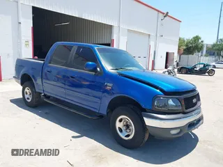 2001 Ford F-150 XLT z VIN 1FTRW07W01KE90204, wystawiony jako IAAI lot #42289853 z przebiegiem Nie podano mil oraz . Historia ofert i sprzedaży dostępna na DreamBid. Obrazek 1.