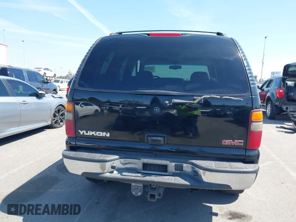 2002 GMC Yukon SLT with VIN 1GKEC13T92R162978, listed as a IAAI auction lot 41851599 with 213,789 mi miles. Bid and sale history available at carsss.com. Image 16.