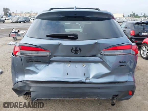 2022 Toyota Corolla Cross XLE with VIN 7MUDAABG6NV007009, listed as a IAAI auction lot 42409061 with 37,178 mi miles and . Bid and sale history available at DreamBid. Image 17.