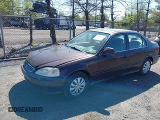2000 Honda Civic EX with VIN 2HGEJ8643YH528913, listed as a IAAI auction lot 42144945 with 259,493 mi miles. Bid and sale history available at carsss.com. Image 2.