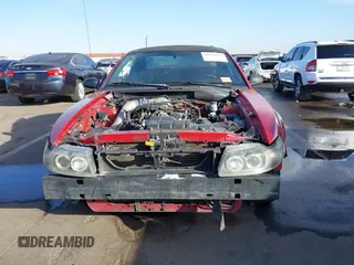 2000 Ford Mustang GT with VIN 1FAFP42X0YF255141, listed as a IAAI auction lot 41558369 with 170,503 mi miles. Bid and sale history available at carsss.com. Image 13.