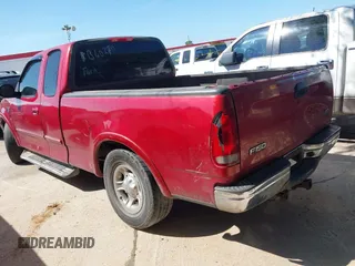 2002 Ford F-150 XL with VIN 1FTRX17W02KB40270, listed as a IAAI auction lot 42573017 with Not provided miles and . Bid and sale history available at DreamBid. Image 3.