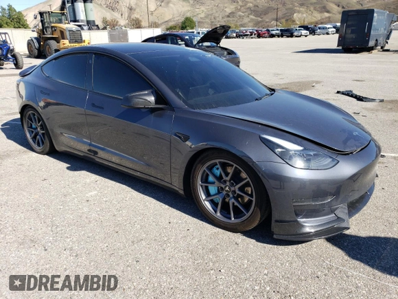 2023 Tesla Model 3 Long Range with VIN 5YJ3E1EB4PF633935, listed as a Copart auction lot 45238705 with 32,972 mi miles and Salvage Title. Bid and sale history available at DreamBid. Image 4.