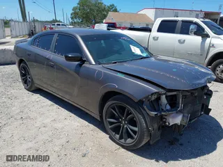 2018 Dodge Charger SXT with VIN 2C3CDXBG9JH121521, listed as a IAAI auction lot 42046459 with 60,040 mi miles. Bid and sale history available at carsss.com. Image 1.