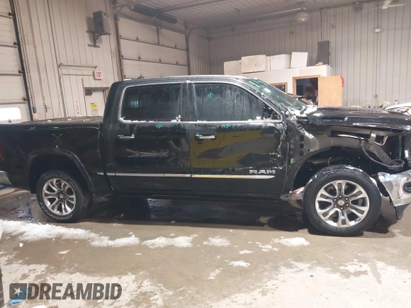 2022 Ram 1500 Limited with VIN 1C6SRFHT9NN481884, listed as a IAAI auction lot 41679409 with 47,571 mi miles and . Bid and sale history available at DreamBid. Image 14.