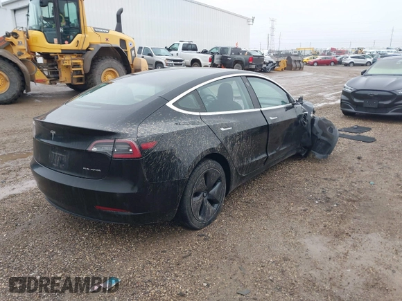2018 Tesla Model 3 Long Range Battery with VIN 5YJ3E1EB1JF127289, listed as a IAAI auction lot 41484253 with 60,577 mi miles and . Bid and sale history available at DreamBid. Image 4.
